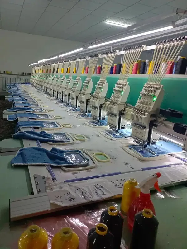 Multi-head embroidery machines running in the in-house embroidery workshop